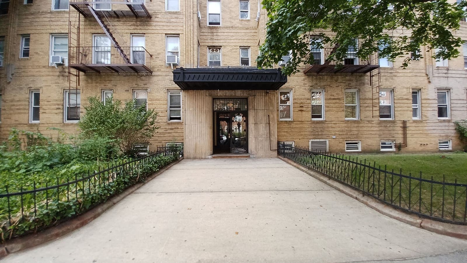 The entrance and front walkway at 2704 Ocean Avenue in Brooklyn