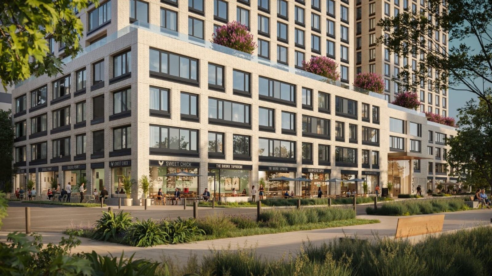 Rendering of the lower floors of a pale brick building with dark-framed windows, ground-floor shops with outdoor tables and umbrellas, flowering trees on a terrace above the fourth floor, towers rising behind, the number 355 beside a canopied entrance, and planted beds and a wooden bench in the foreground