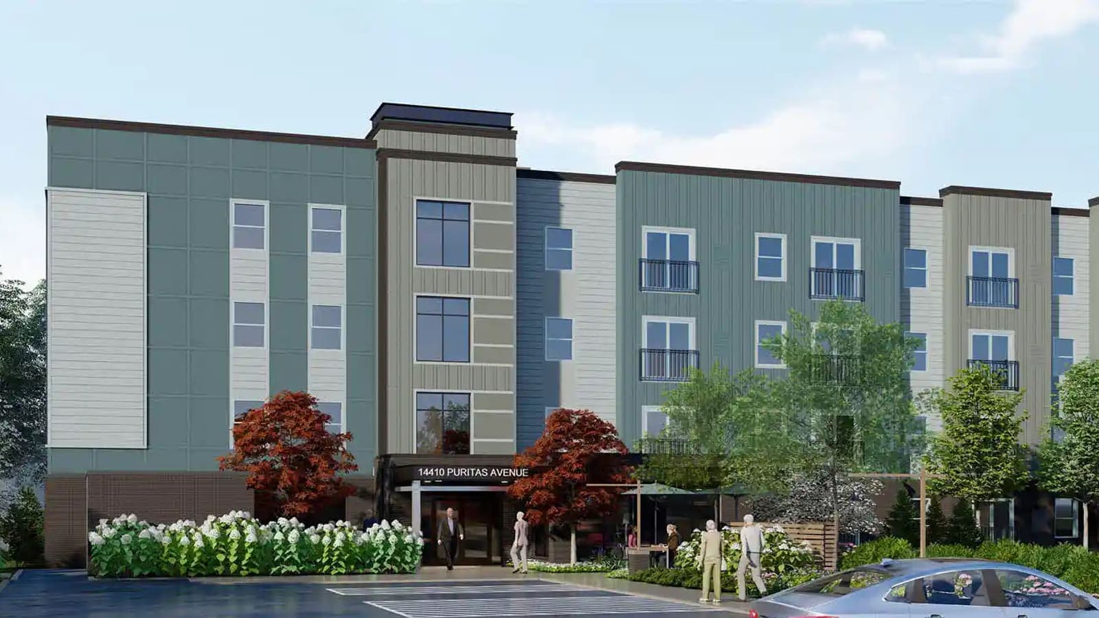 Rendering of a four-story apartment building with blue-gray and tan siding, a brick ground floor and an entrance canopy lettered 14410 Puritas Avenue