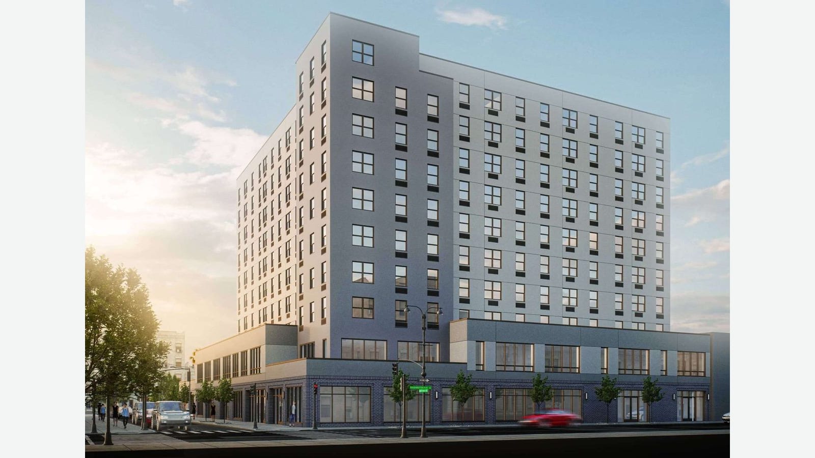 Rendering of a 10-story light gray apartment building on a street corner under a blue sky, with rows of square windows, a two-story base with large storefront windows and dark blue brick, street trees, a green street sign reading Washington Ave, a traffic signal and cars on the street