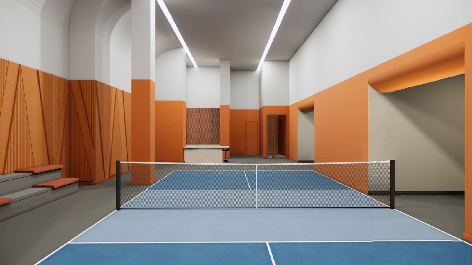 Rendering of an indoor pickleball court with a blue playing surface and a black net, orange and white walls, bench seating on the left and a small counter at the far end