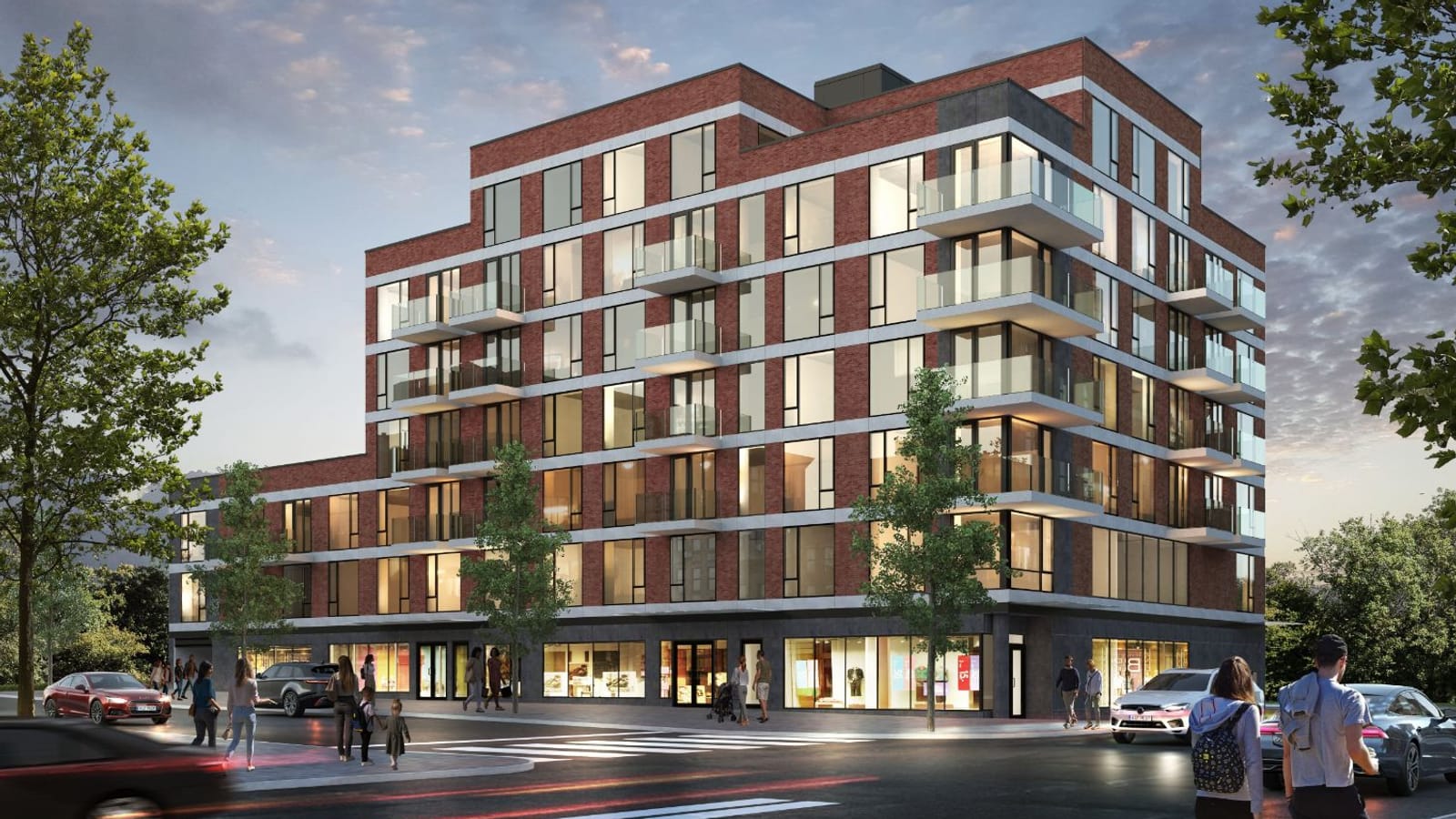 Rendering at dusk of a seven-story red brick apartment building on a street corner, with white bands at each floor, glass-railed balconies, a stepped top floor and a dark ground floor of shop windows, with trees, parked cars and people on the sidewalks