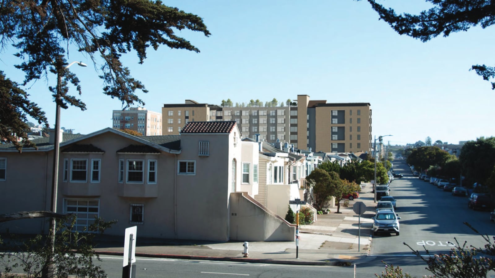 A view down a residential avenue from Lincoln Way, with two-story houses in the foreground and the seven-story building drawn in beyond them