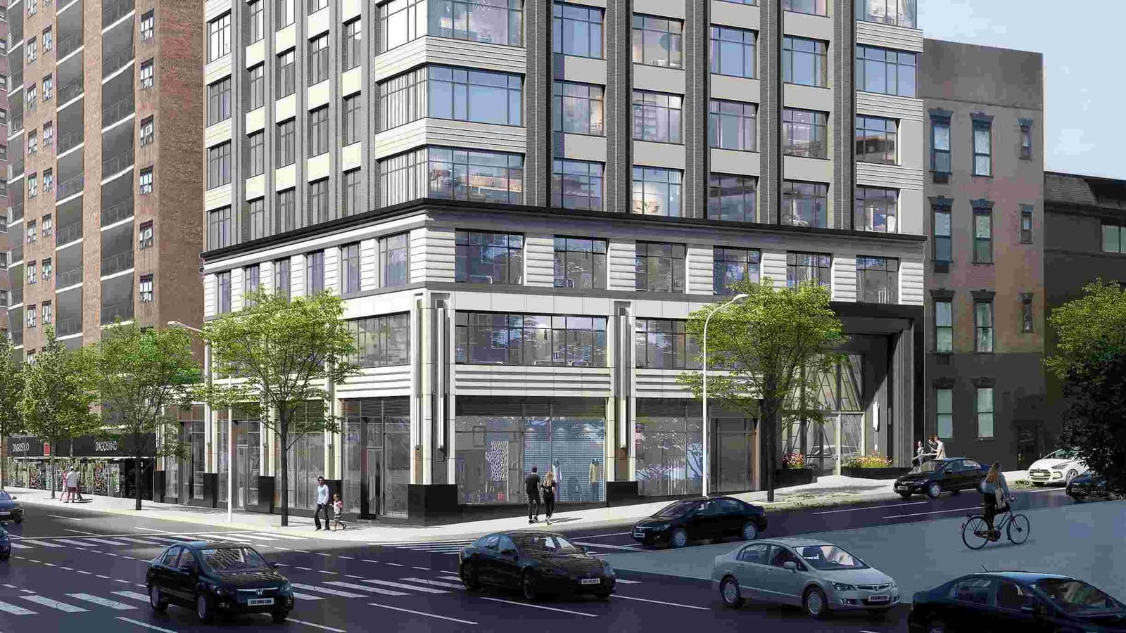 Rendering of the lower floors of a new apartment tower on a street corner, with grey and dark vertical bands, wide windows and a light stone base with shop windows, a tall dark entrance portal on the side street, street trees, a row of older brick buildings at the right, a taller brick apartment block and a grocery awning at the left, and cars and a cyclist in the street