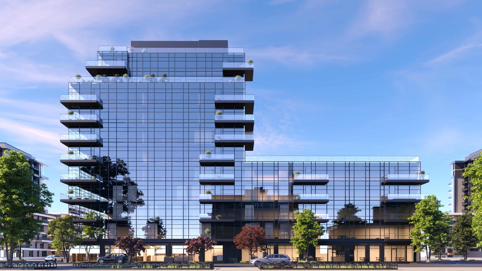 Rendering of a building clad in reflective glass with a dark grid of window frames: a taller wing at left with stacked balconies at its corners and a setback near the top, a lower wing at right, shopfronts at street level, street trees and two parked cars in front, under a blue sky
