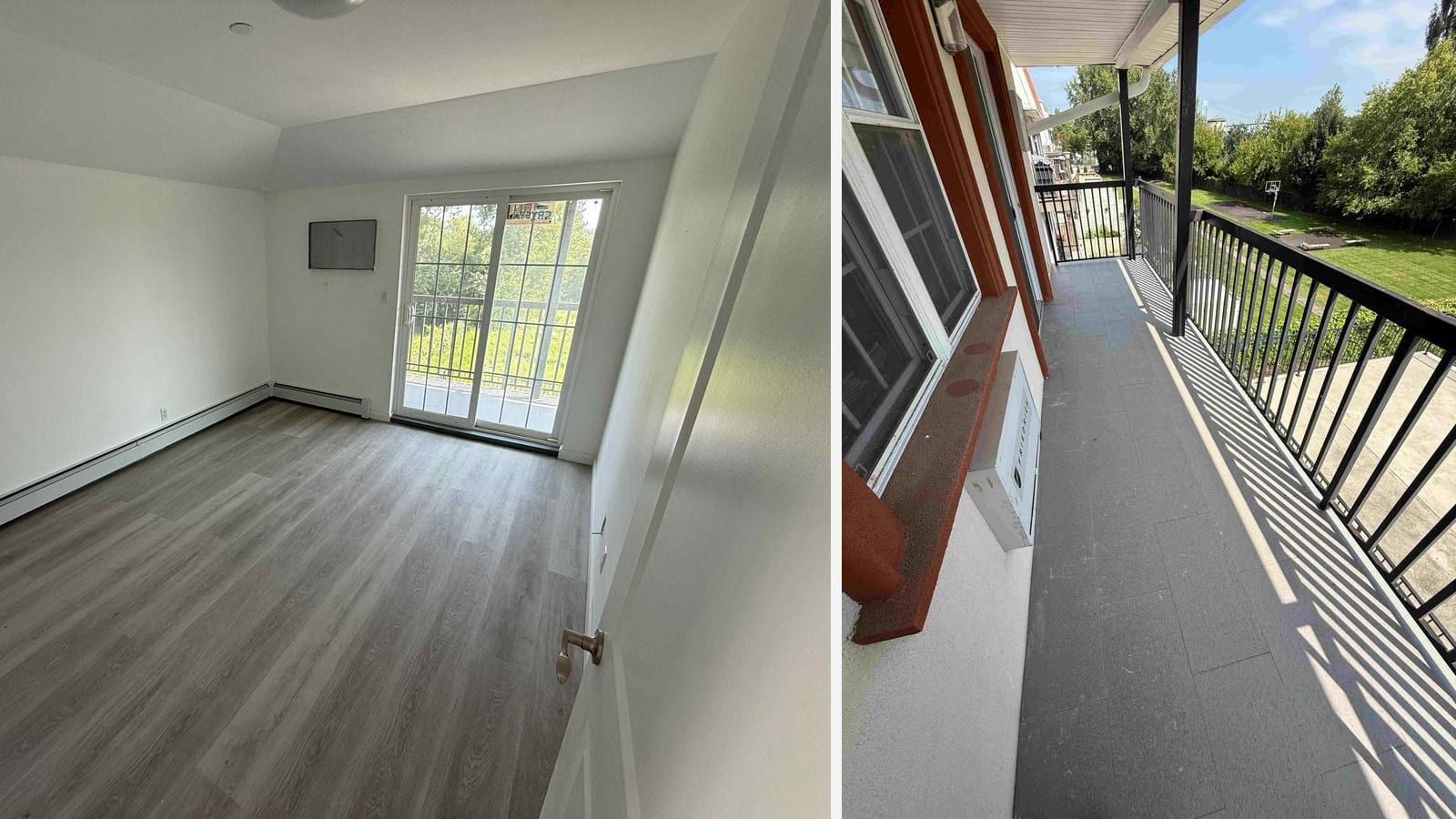 Two photographs side by side: at left, an empty room with grey wood-look flooring, white walls, a sloped ceiling, baseboard heaters and a sliding glass door to a balcony with black railings and trees beyond, a dark blank panel mounted on the wall beside it; at right, a long covered balcony with a grey tile floor and black metal railings along a white wall with red-trimmed windows, looking out over a lawn with a basketball hoop and trees