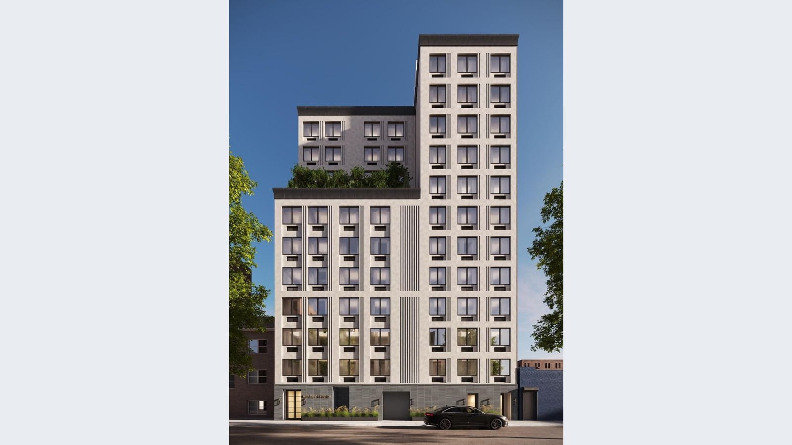 Rendering of a 12-story building with a pale stone-colored facade, rows of square black-framed windows with vents below each, a lower wing on the left with a planted roof terrace and a setback upper section, a dark gray tiled ground floor with a glass entrance door and planters, and a black car parked at the curb, under a clear blue sky, shown on a plain light background