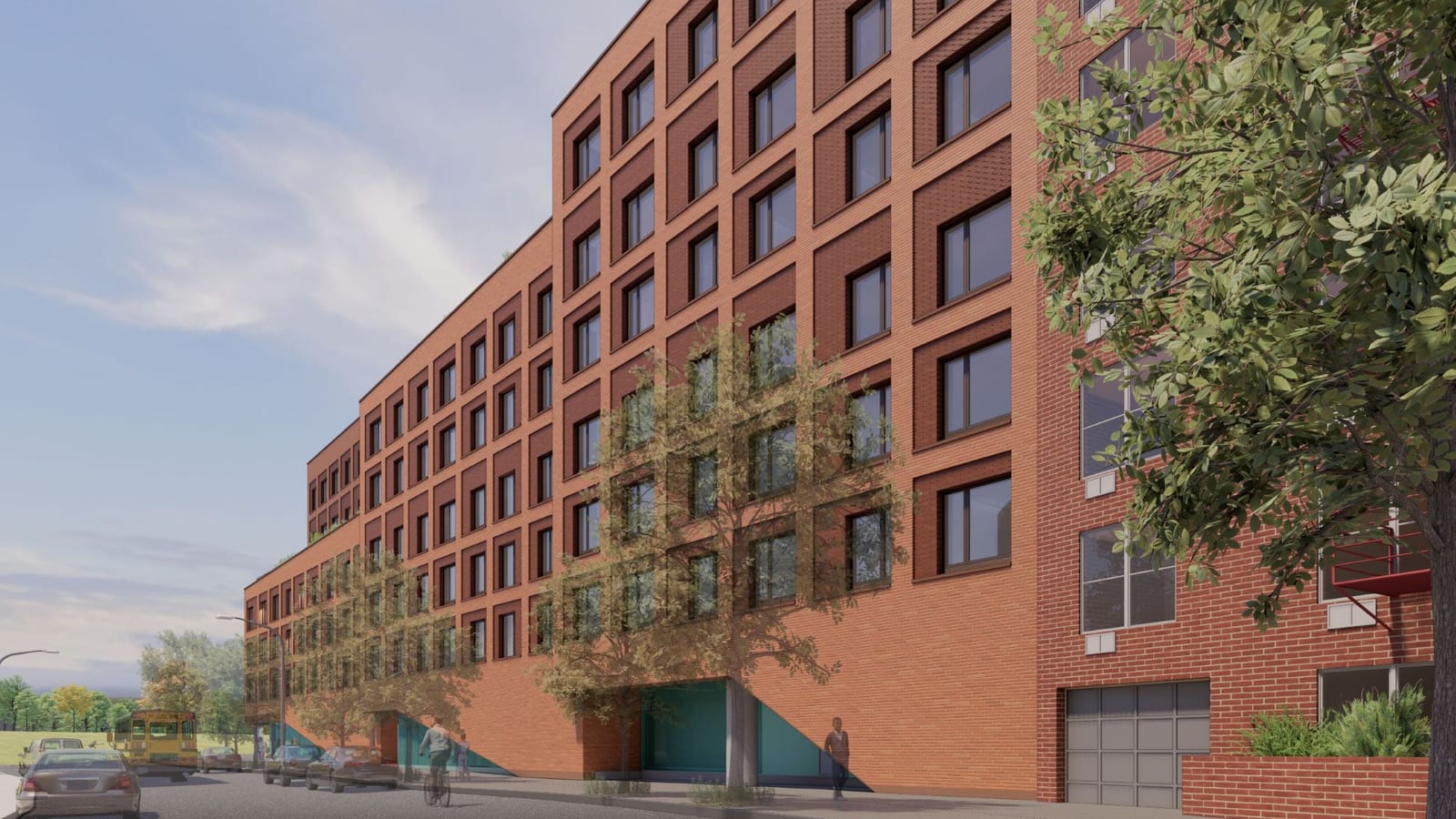 Rendering of the long side of a red brick apartment building stepping up in height along a side street, with a grid of windows in darker brick panels, teal panels at the ground floor, street trees, parked cars, a yellow school bus in the distance and, at the right edge, an older brick apartment house with fire escapes and a garage door