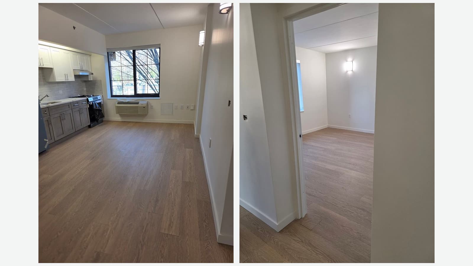 Two photographs side by side of an empty apartment with wood-look floors: at left a living room with a wall of kitchen cabinets, white uppers and gray lowers, a sink and a range partly covered in black plastic, a window over a wall heating and cooling unit; at right a view through a doorway into an empty bedroom with a window and a wall light