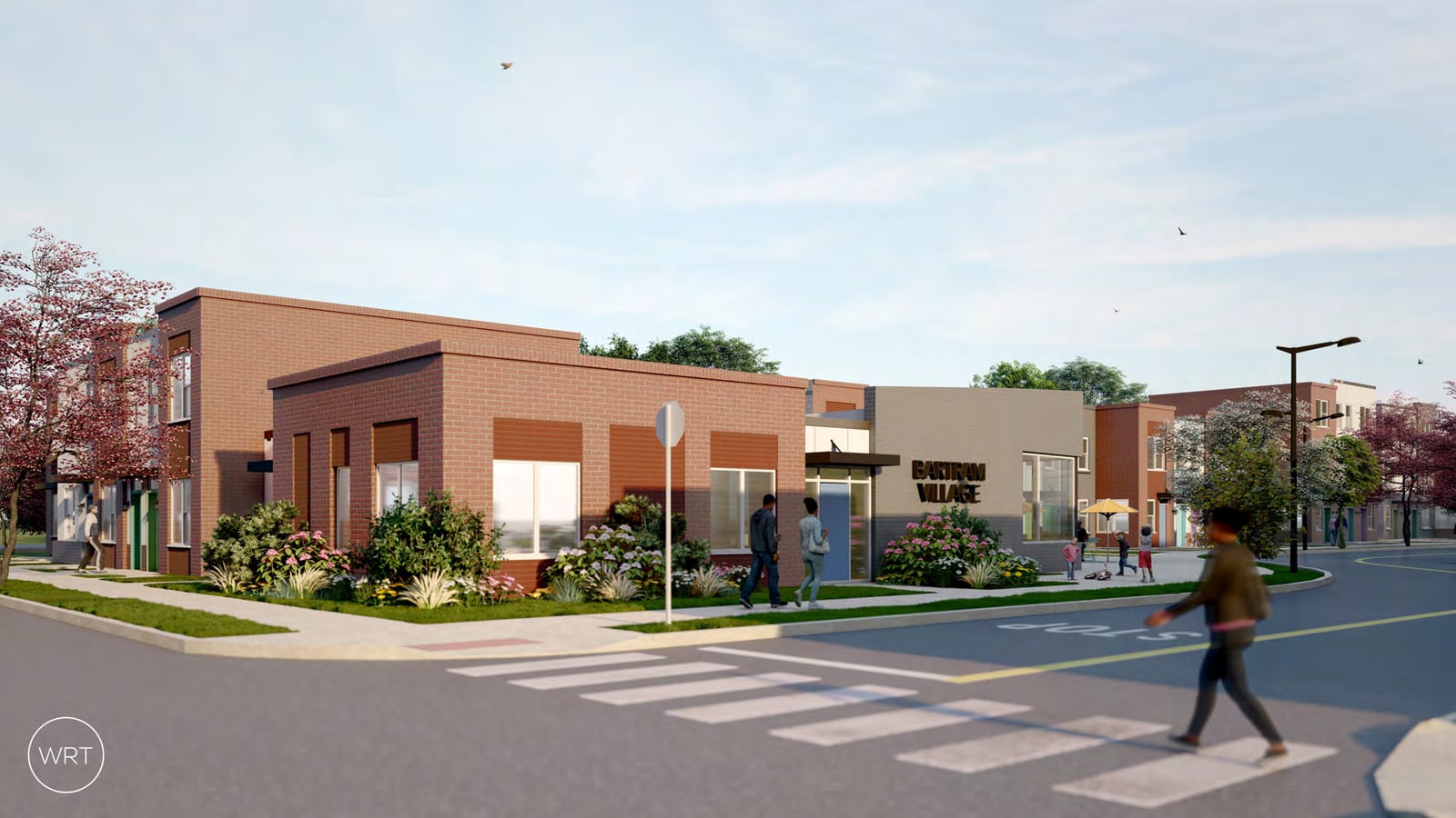 Rendering of a low red brick community building with a sign reading Bartram Village at a street corner, with three-story apartment buildings behind it, flowering trees and people on a crosswalk