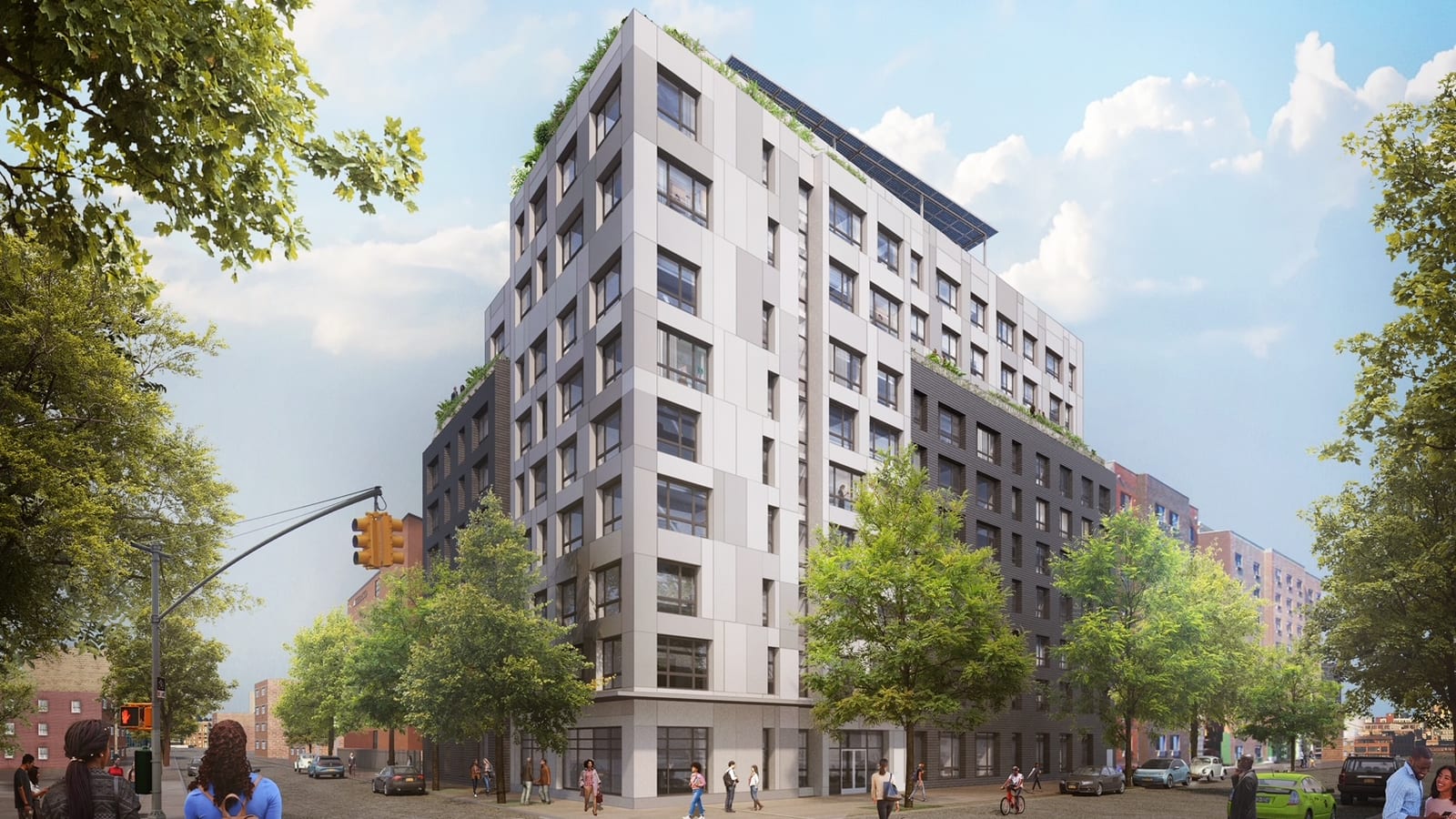 Rendering of the same 10-story building seen from a street corner, its pale gray paneled corner rising above charcoal brick wings, solar panels on the roof, a New York City traffic signal on a pole at left, crosswalks and people crossing the street