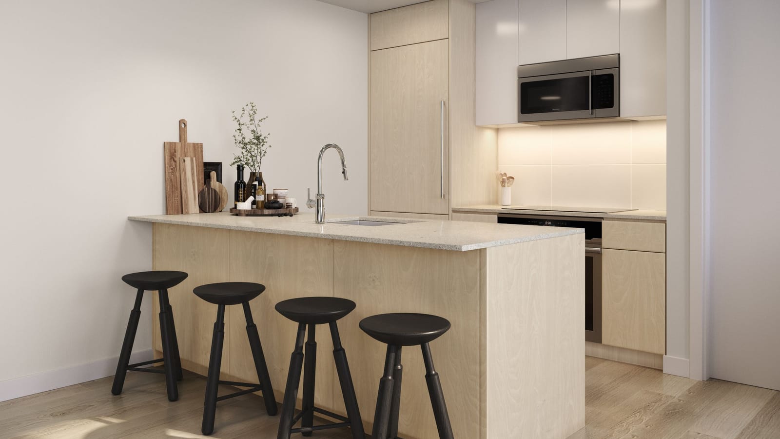 Rendering of a kitchen with a pale wood island topped in light stone, four black stools, a pull-down faucet, a tall panelled cabinet, white upper cabinets, a stainless-steel microwave above a smooth black cooktop and a wall oven below the counter