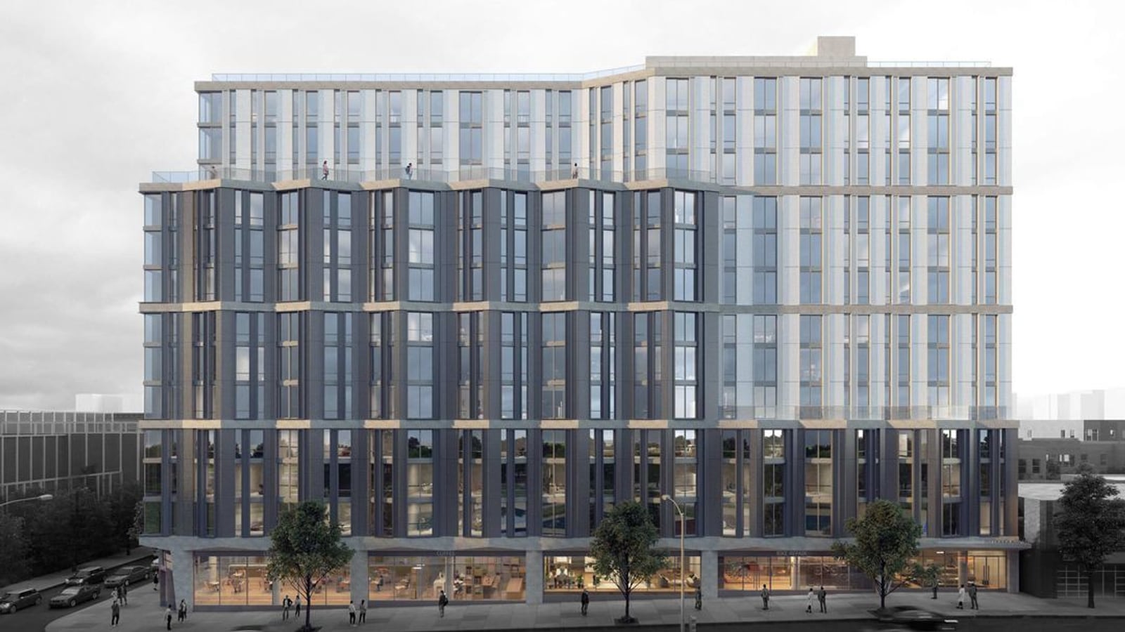 Rendering of a wide apartment building seen straight on from across a street, with a glass ground floor of shops and people on the sidewalk, floors of tall windows between dark angled piers divided into three bands by pale ledges, and a lighter upper section set back behind a glass-railed terrace, under a grey sky with street trees in front