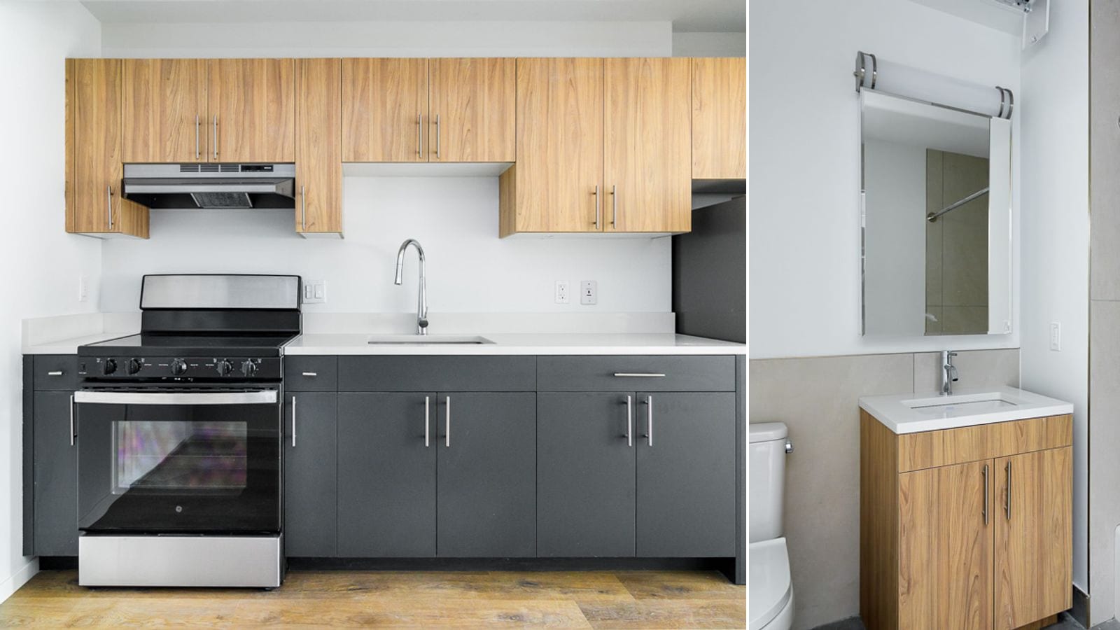 Two photographs side by side: at left an empty kitchen with wood-tone upper cabinets, dark grey lower cabinets, a white counter with a sink, a range hood and a black smooth-top electric range with a stainless-steel front; at right a bathroom corner with a mirror under a light bar, a white sink on a wood-tone vanity, grey wall tile and the edge of a toilet