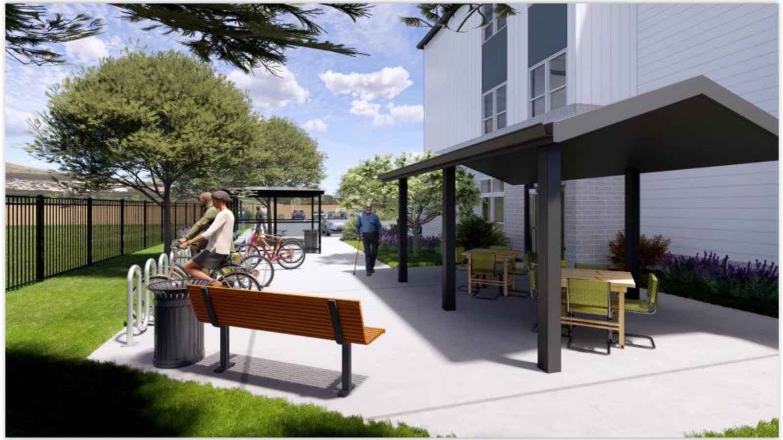 Rendering of a covered picnic shelter with tables and a bench beside the building, with bike racks and a second small shelter behind a black fence