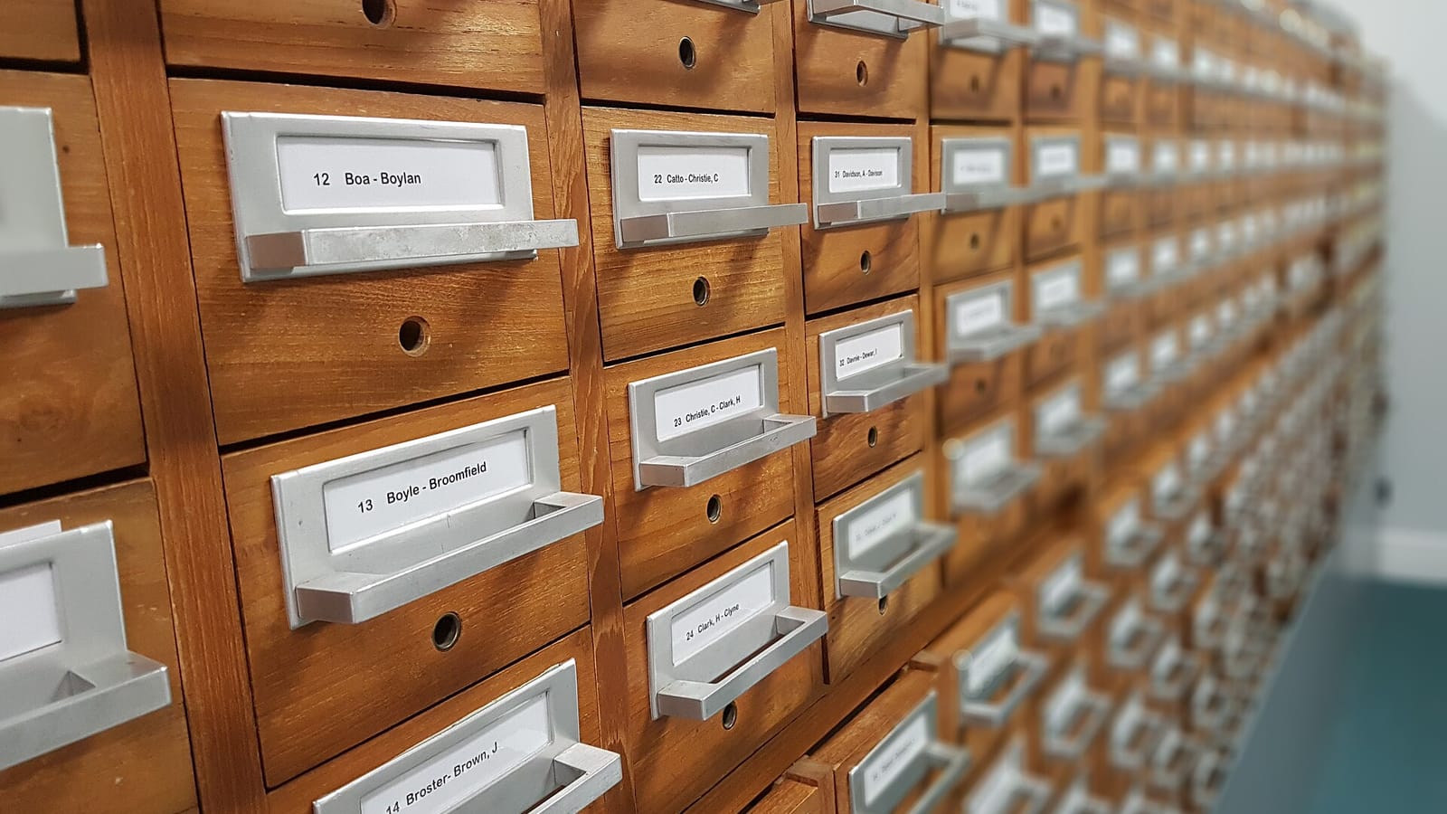 Wooden card-file drawers with label holders