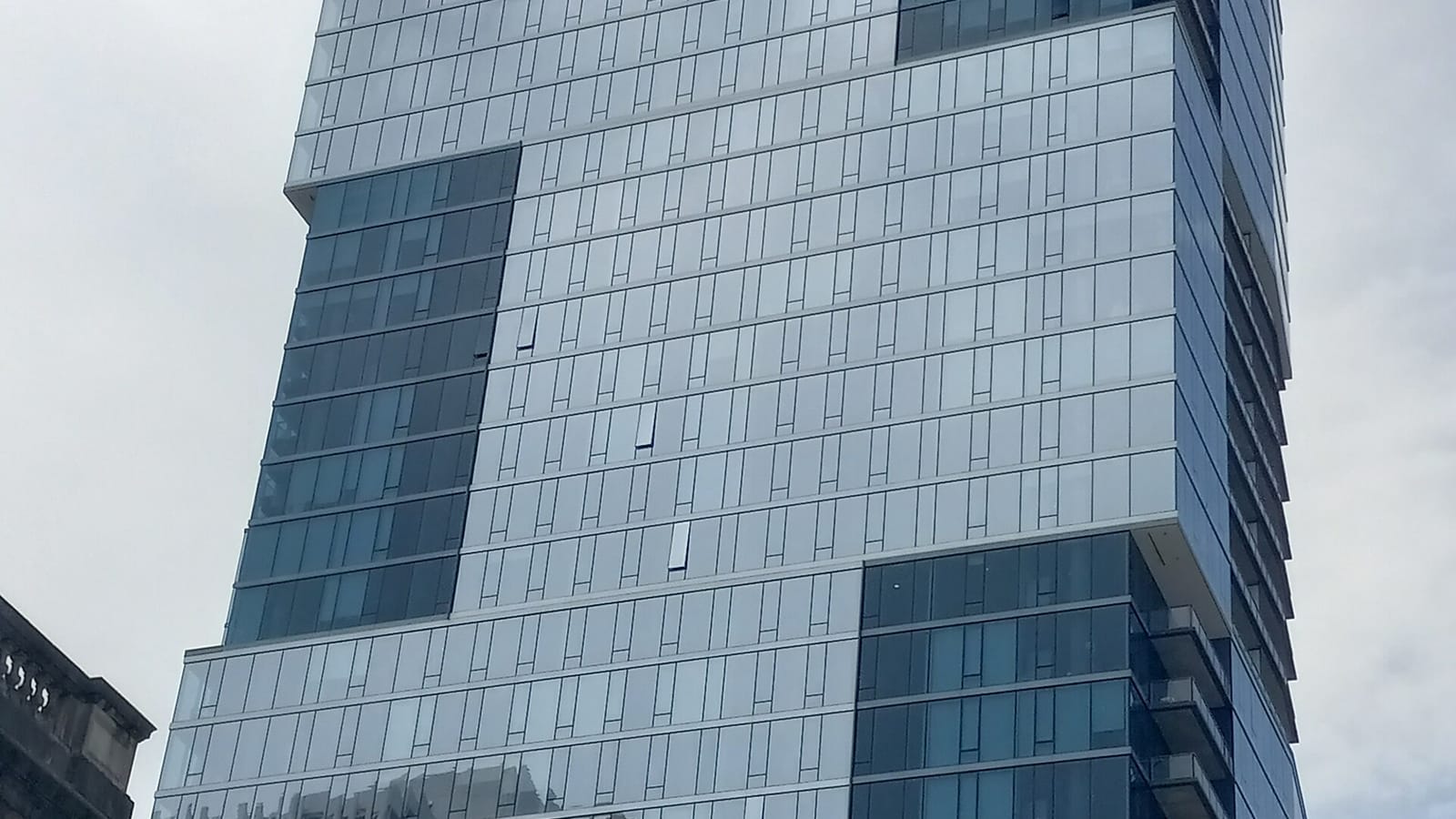 Modern glass tower with broad horizontal facade divisions