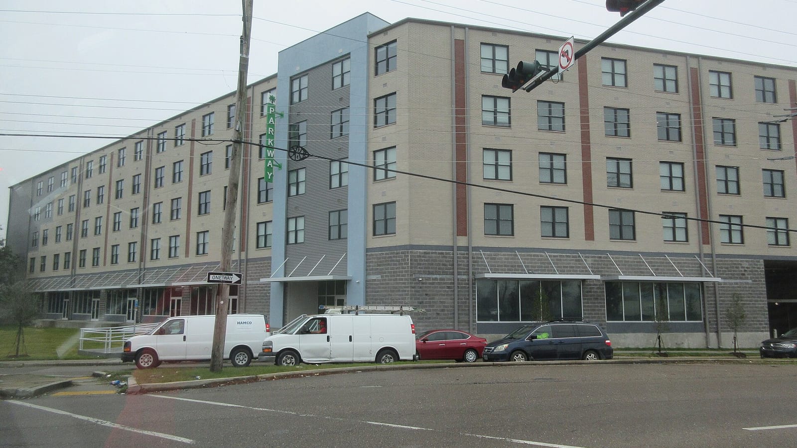 Modern apartment building beside a wide intersection