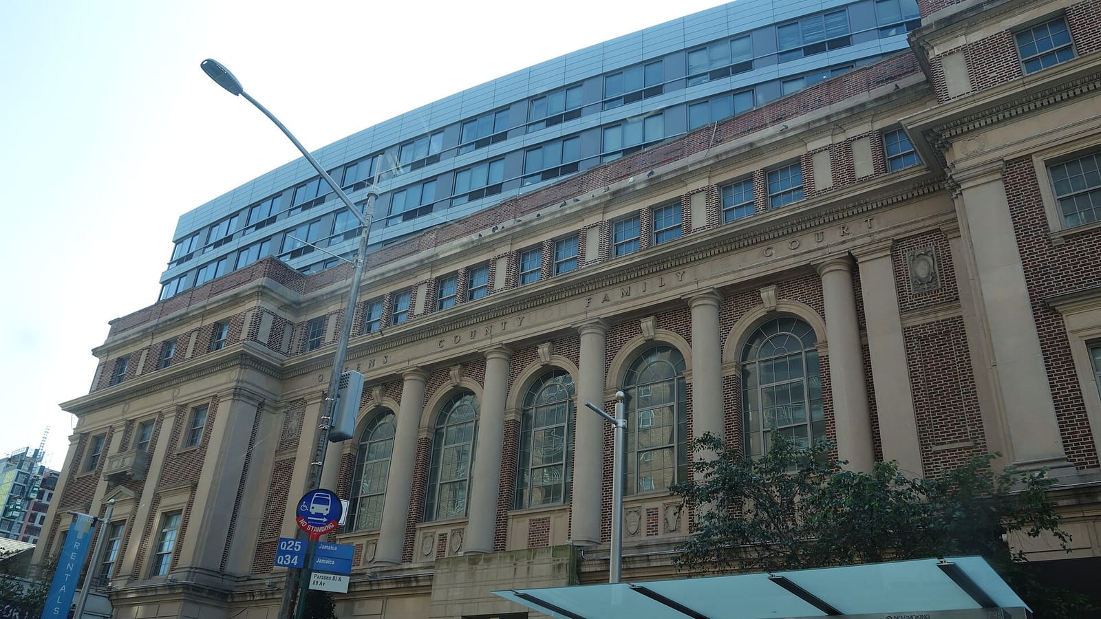 Apartment building above a historic stone facade