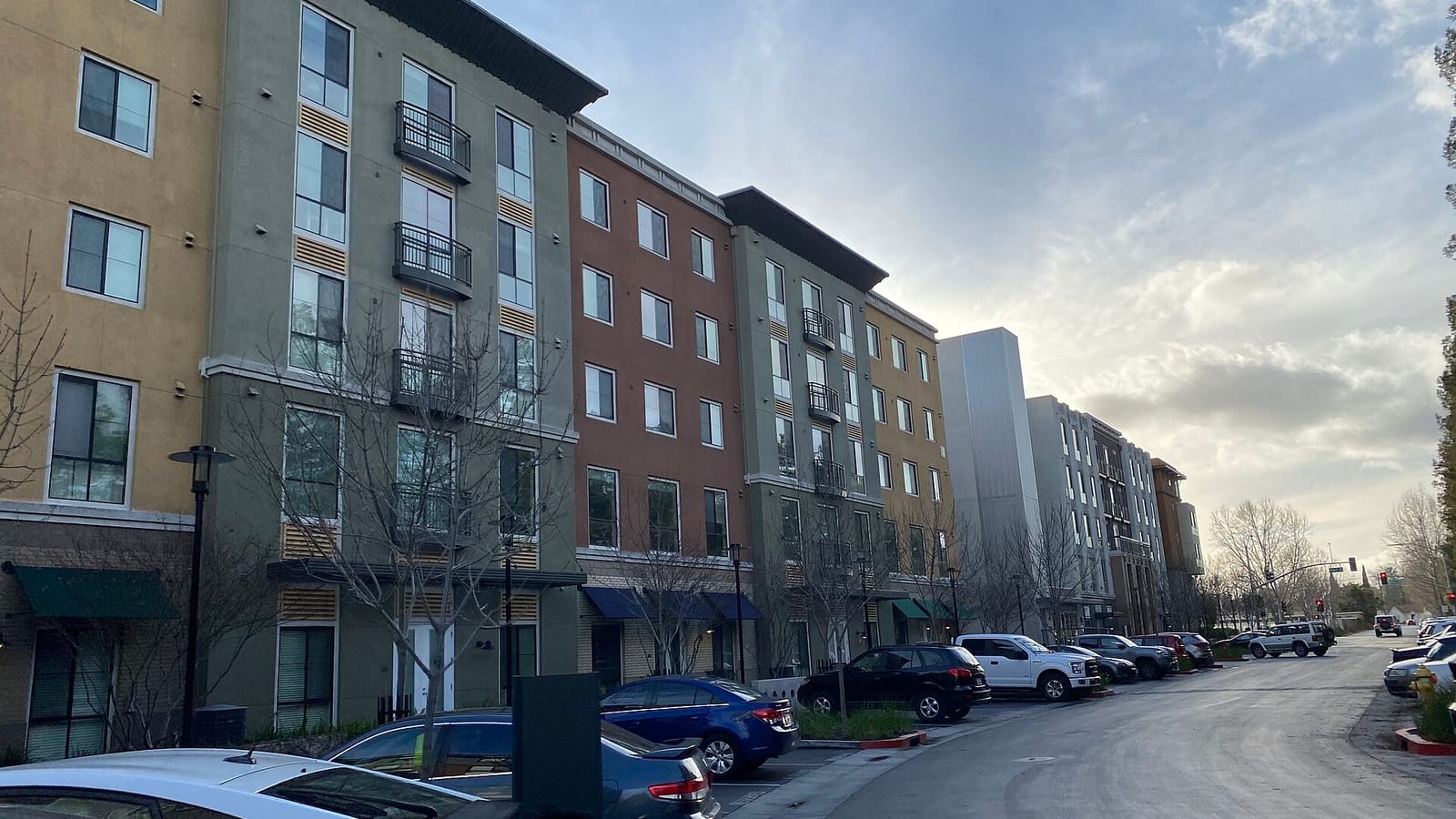 Apartment buildings lining a residential street
