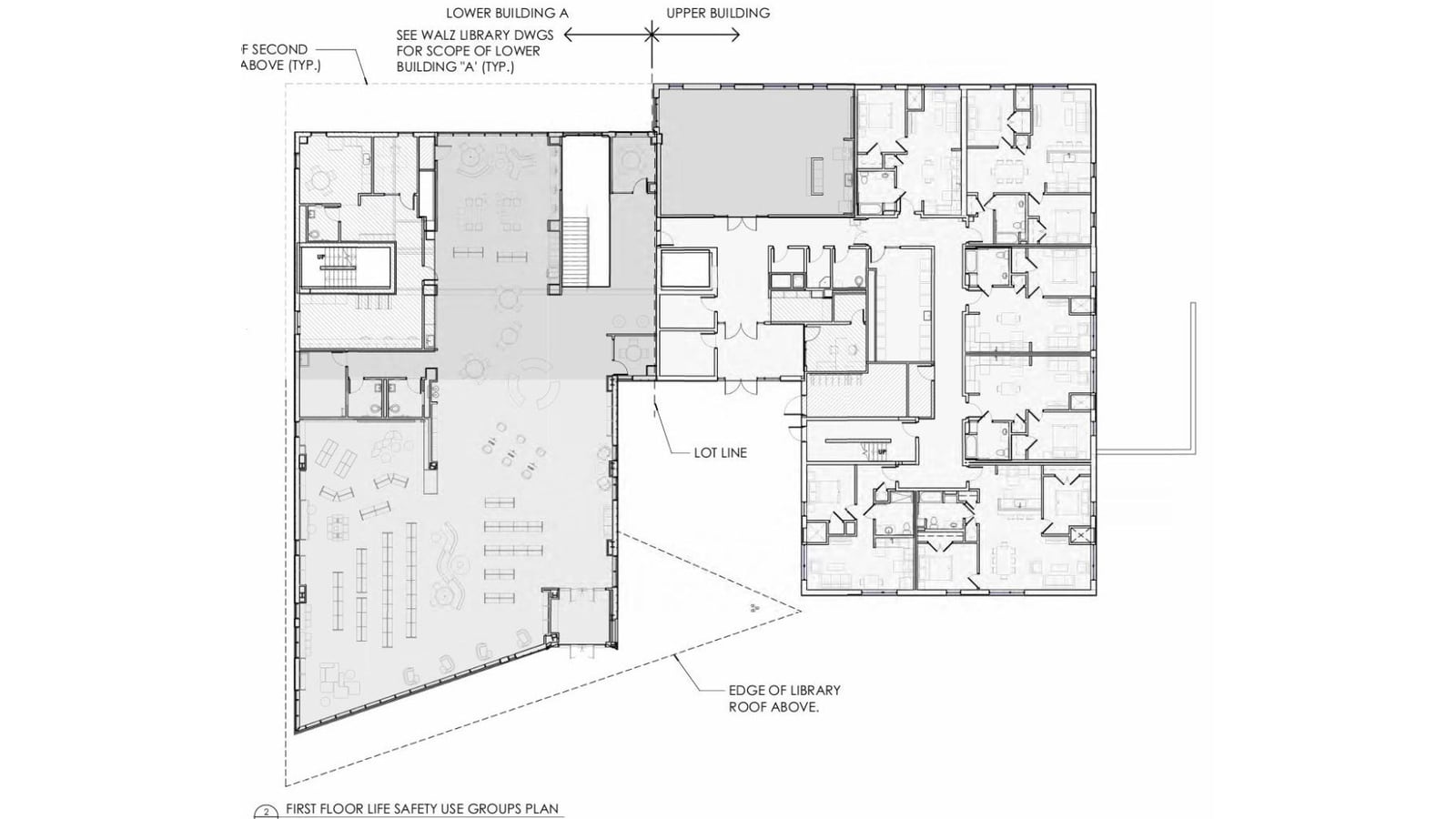Architectural plan of a first floor with a library reading room on the left and smaller rooms on the right, divided by a lot line