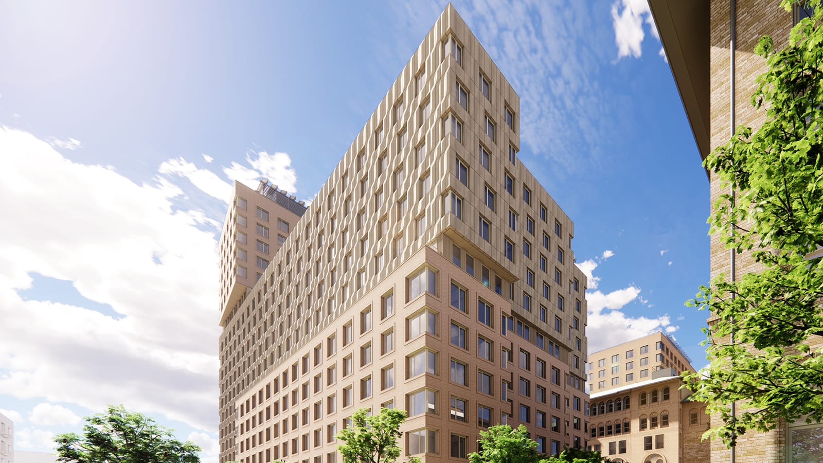 Rendering looking up at the building from street level: a brick base with large windows, beige patterned panels on the floors above, a taller tower section behind at left, street trees in front and older brick buildings with arched windows at right
