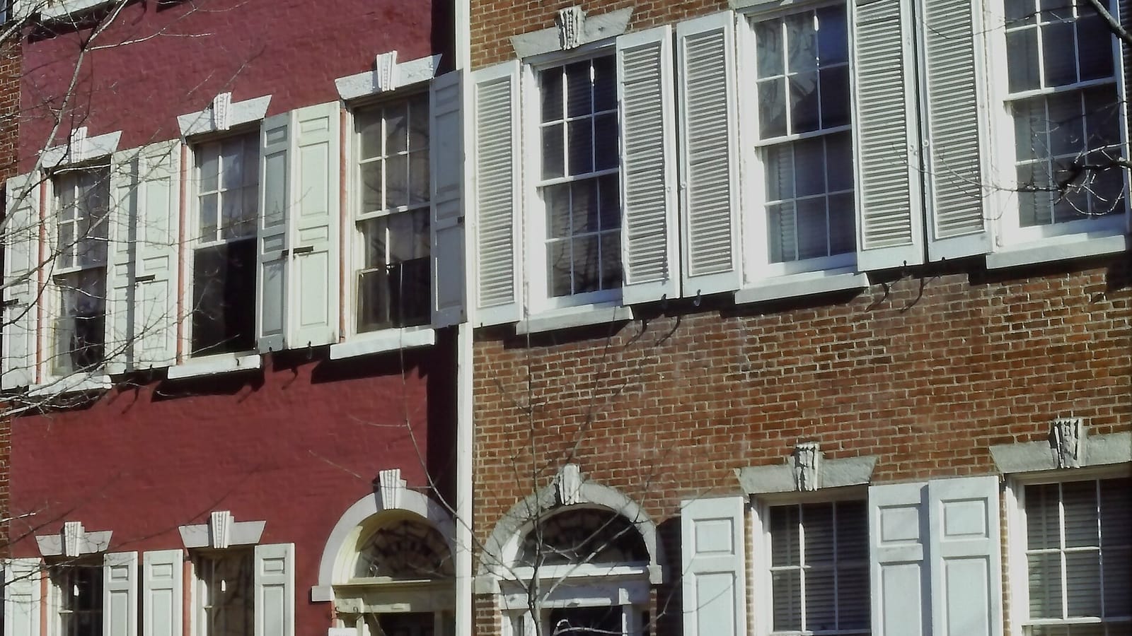Brick rowhouse facades and front steps