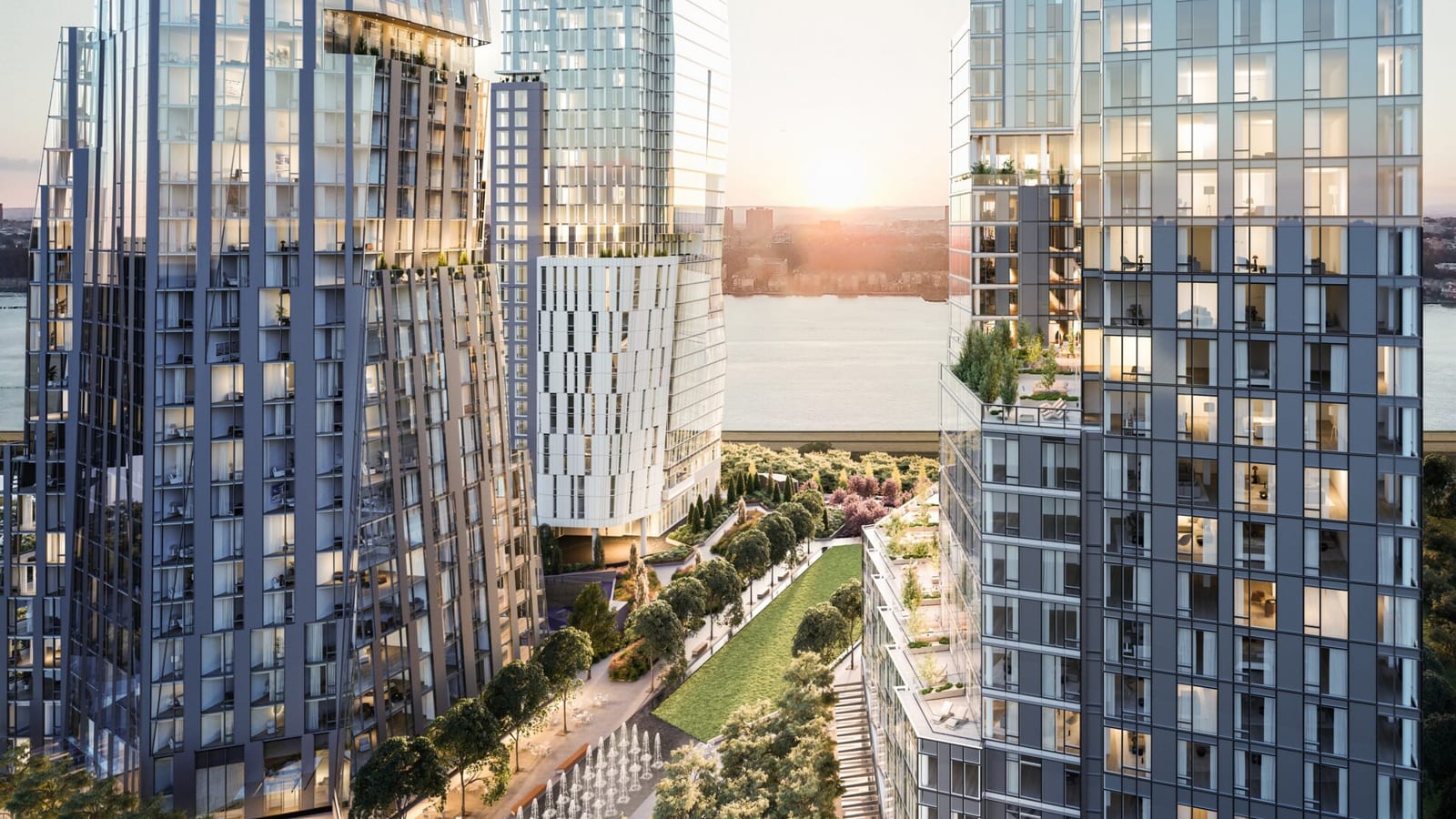 Rendering of three glass towers around a long park with a lawn, fountains and tree-lined paths, with a white-paneled tower at center in front of the Hudson River at sunset