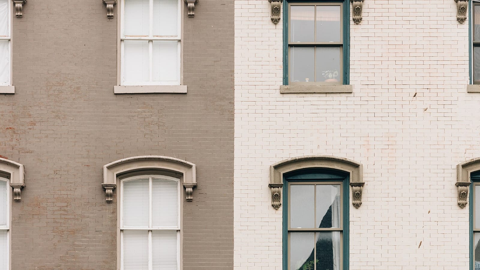 Close view of brick rowhouse facades and windows