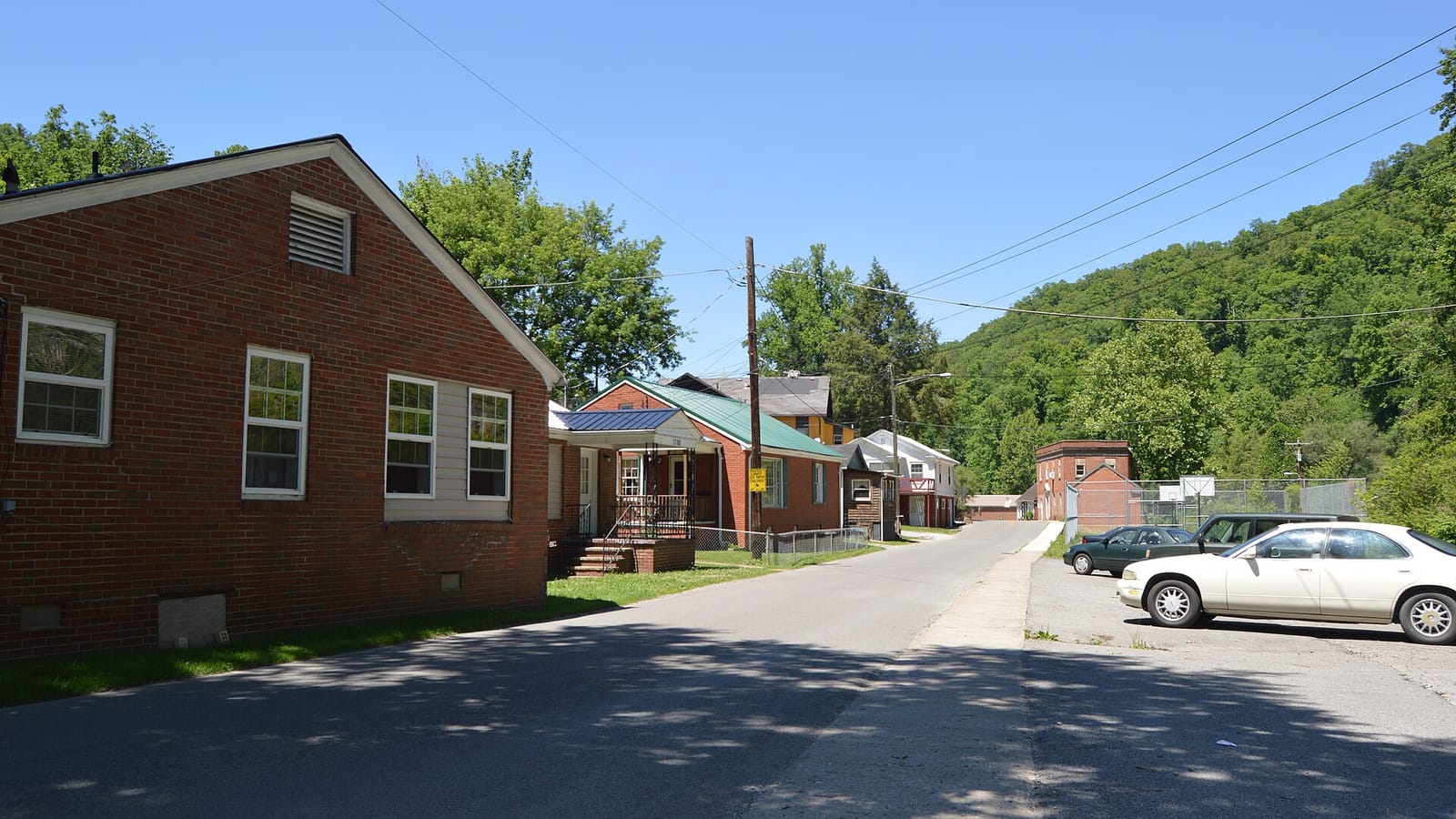 Low brick houses beside a street