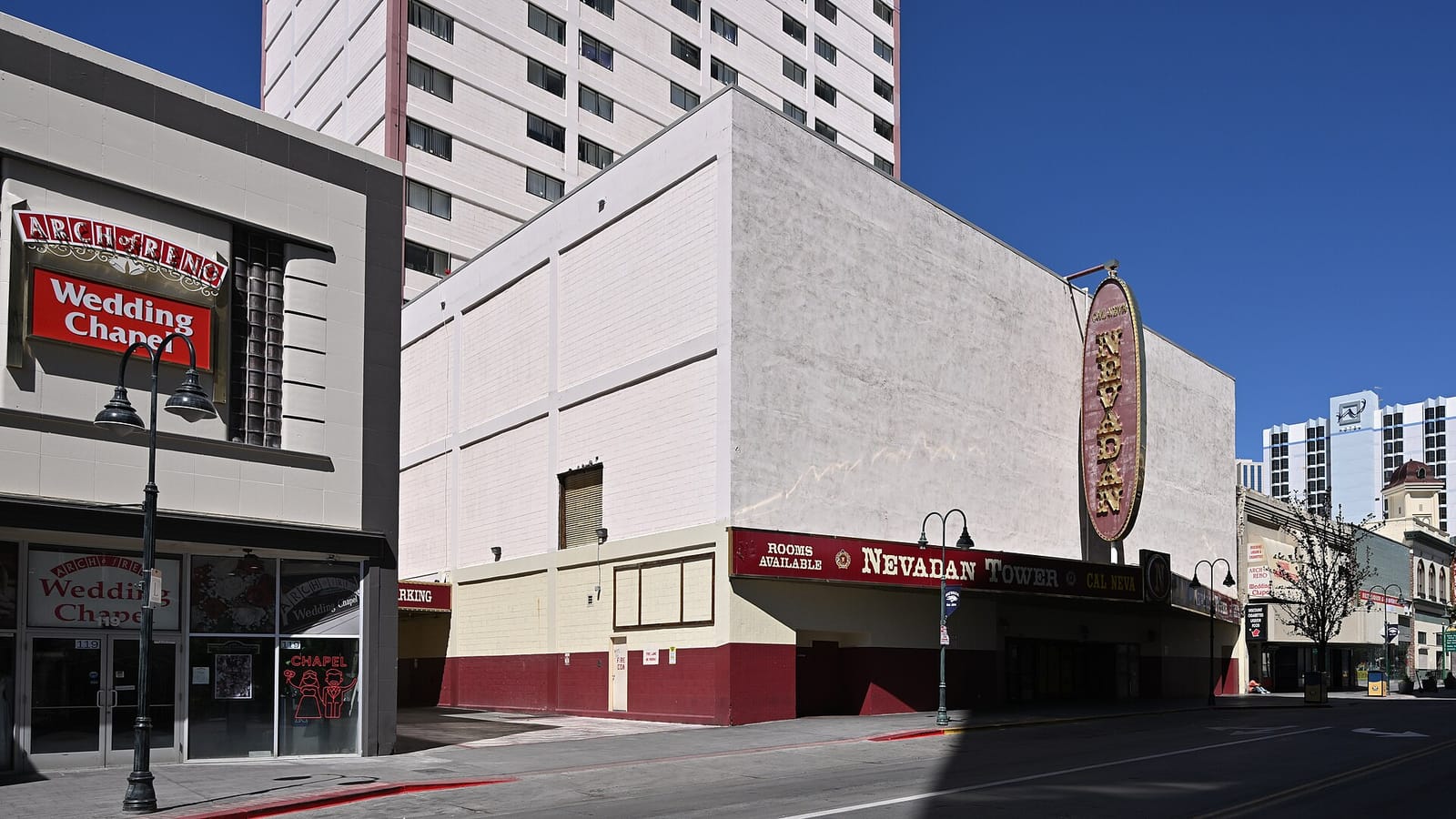 Apartment tower above a former hotel entrance