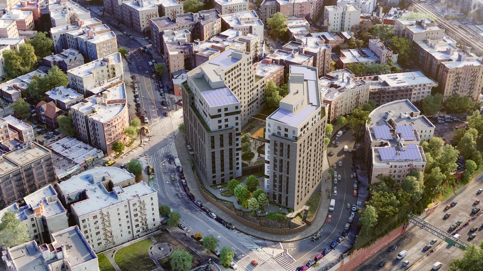 Aerial rendering of two tall apartment buildings in grey and pale brick with solar panels on their roofs, standing on a rounded corner lot with a planted courtyard between them and a retaining wall along the street, surrounded by older brick apartment houses, with a highway at the lower right and an elevated rail line at the upper right