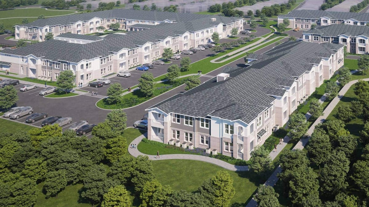Detail of a rendering showing two-story apartment buildings with balconies, a parking court with cars, a curved walking path and trees