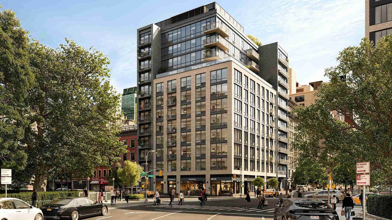 Rendering of a 12-story apartment building on a street corner, with a light gray brick lower section, dark gray side wings with stacked balconies, a glass upper section set back above the eighth floor, ground-floor shops, street trees, a crosswalk with people and cars, and a street sign reading W 24 St