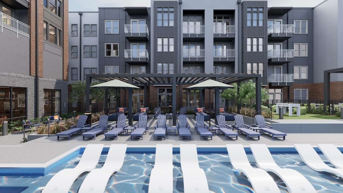 Rendering of a courtyard pool with rows of blue loungers and umbrellas between four-story apartment wings