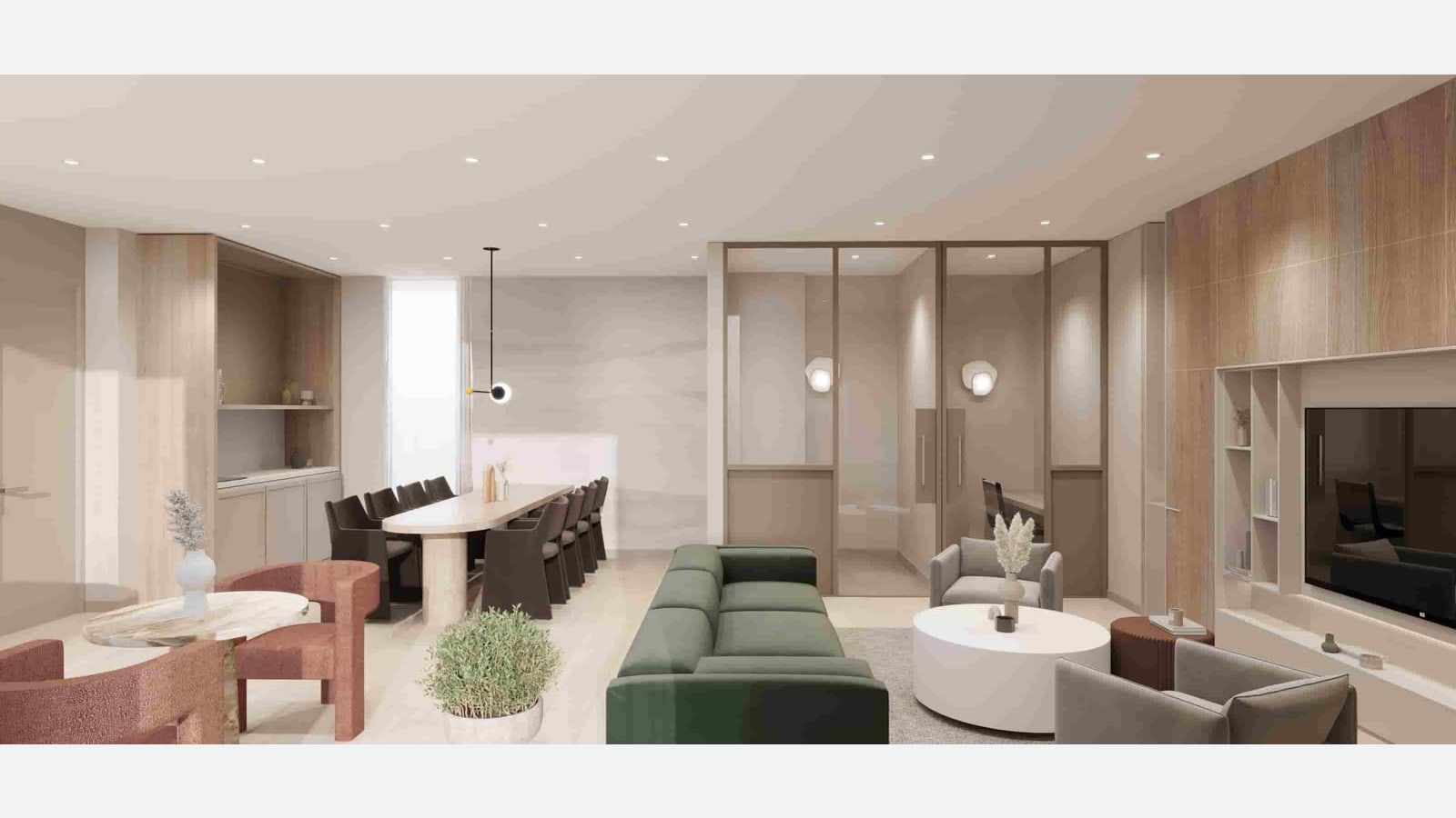 Rendering of a long shared room with a green sofa, gray armchairs and a round white table, a long dining table with dark chairs, a pantry wall, glass-walled small rooms, a wood-paneled wall with a television, and pink chairs around a round table at left
