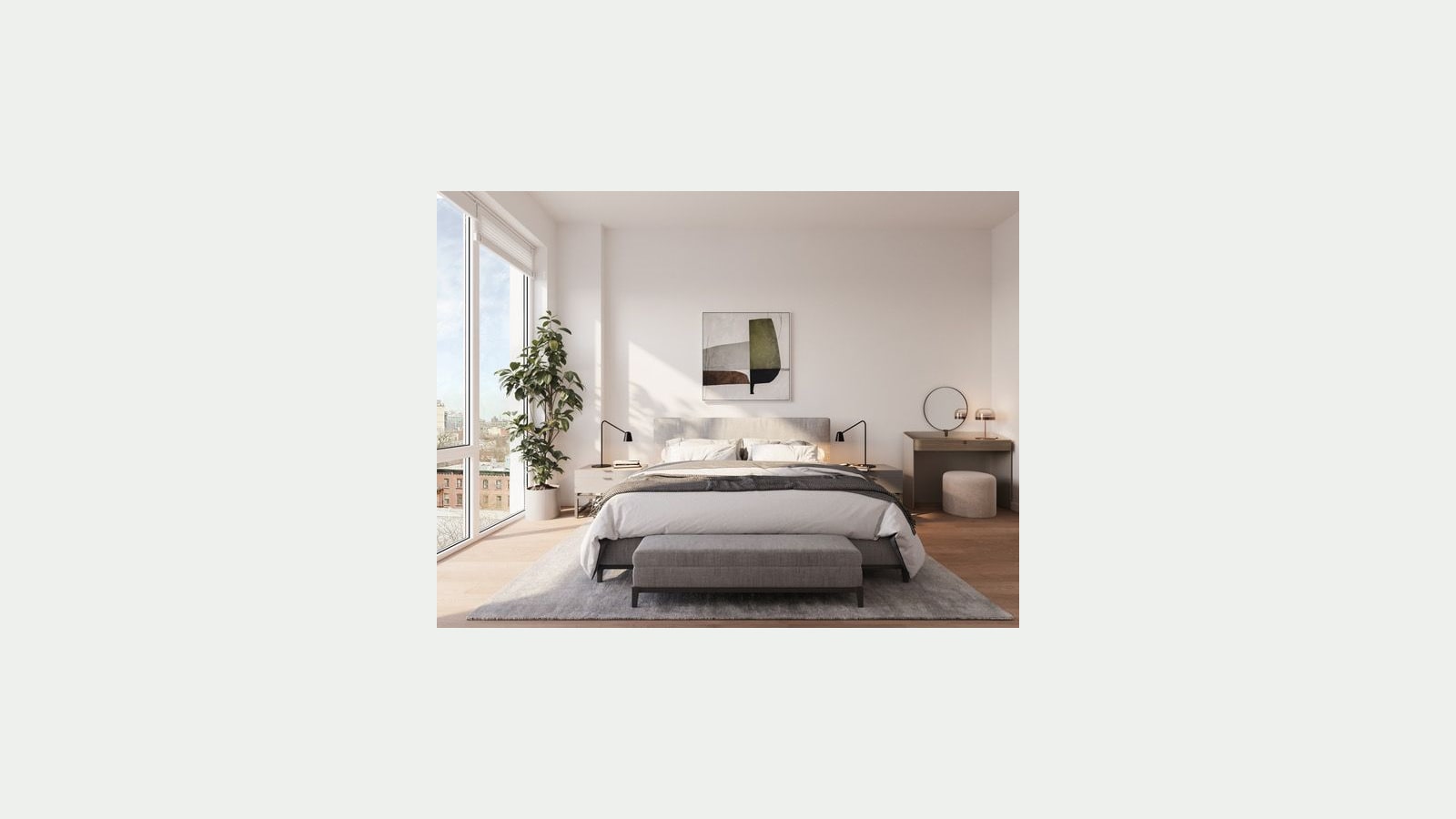 Rendering of a bedroom with a gray upholstered bed and bench on a gray rug, two black reading lamps, a framed abstract print, a small dressing table with a round mirror and stool, a potted tree and a floor-to-ceiling window over brick row houses