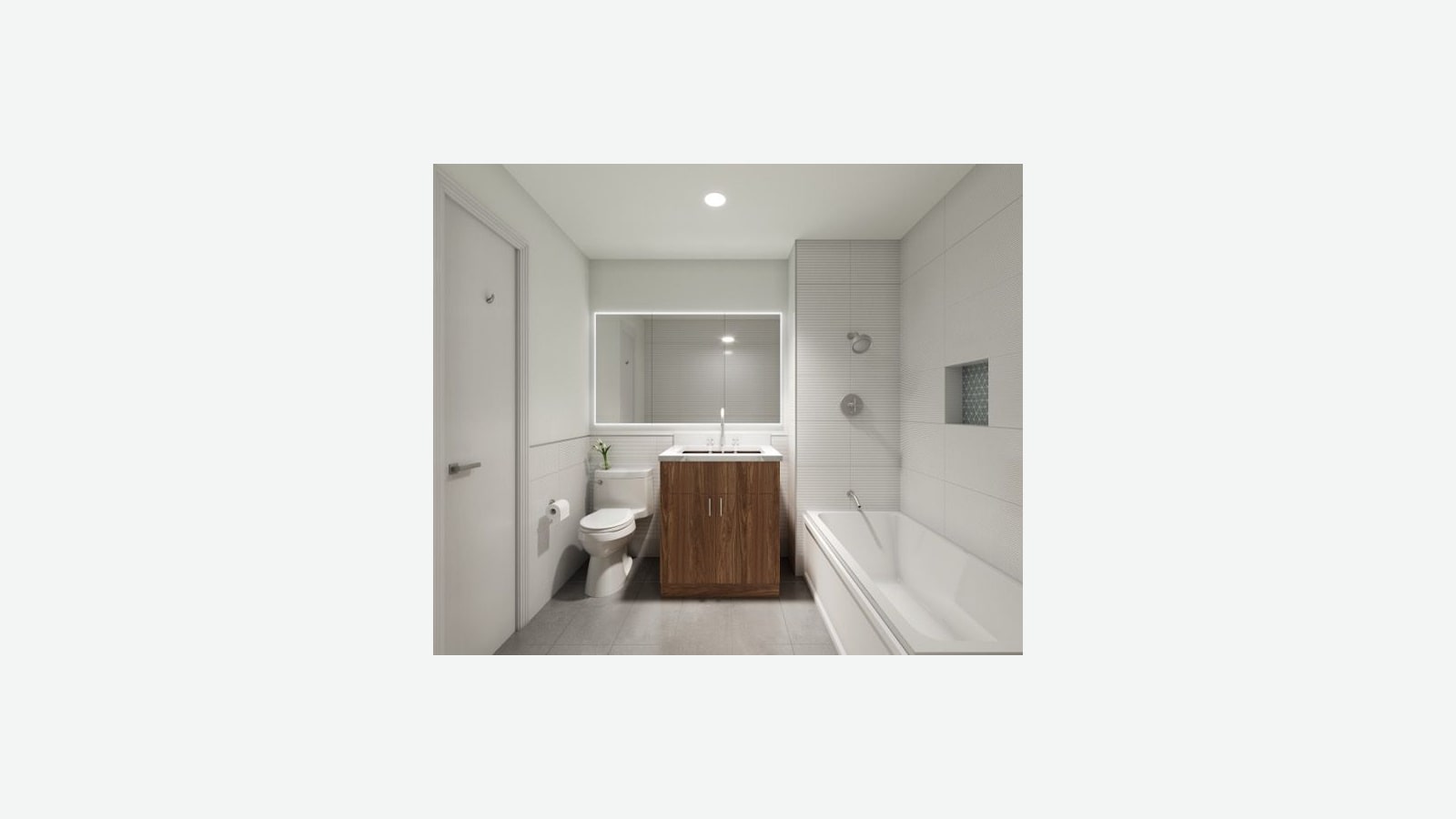 Rendering of a bathroom with white tiled walls, a lit rectangular mirror over a wood vanity with a white top, a white toilet with a small plant, a shower and tub with a tiled niche, and gray floor tiles
