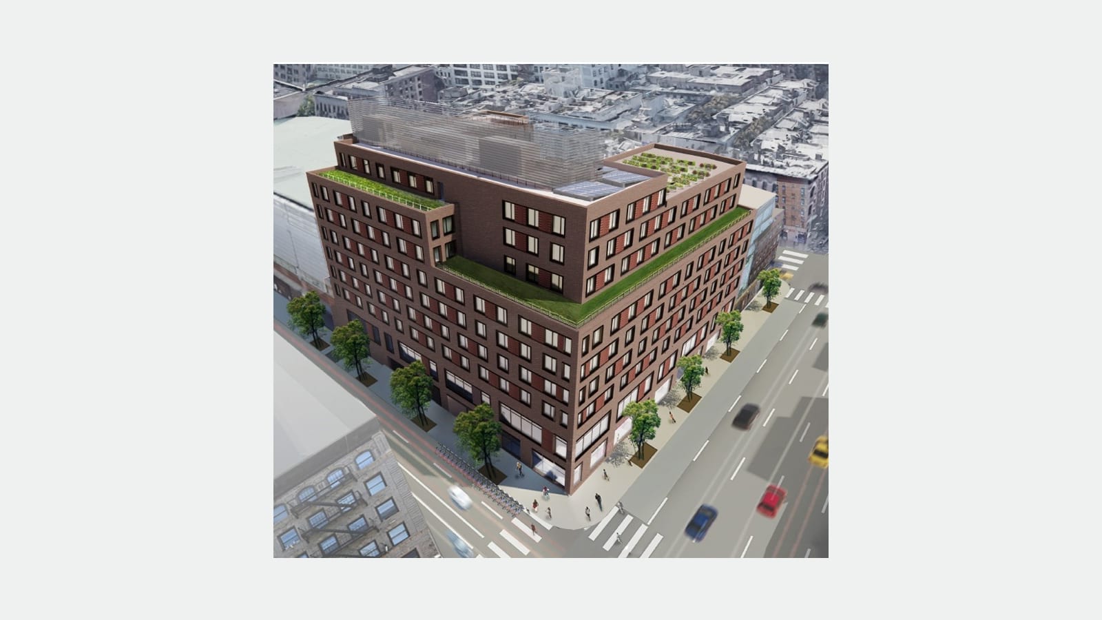 Rendering seen from above of a nine-story red-brown brick building on a street corner, with green planted roofs on two setbacks, a rooftop garden, solar panels and a gray screened rooftop structure, street trees along both sidewalks, crosswalks, cars and a yellow taxi on the avenue, and older walk-up buildings around it