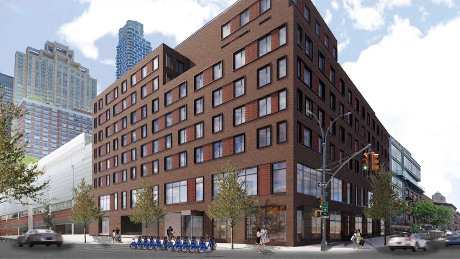 Rendering of a nine-story building of red-brown brick with darker brick panels beside rows of black-framed windows, on a street corner with a traffic light, a row of blue bike-share bikes, street trees, a few small figures on the sidewalk, a long white building at left and taller towers behind under a cloudy blue sky
