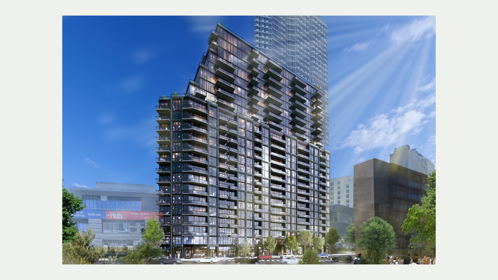 Rendering of a tall apartment building of dark metal frames and floor-to-ceiling glass with rows of balconies, its upper floors stepping back toward a taller glass tower behind it, seen from a street with trees and passing cars, a low building with Hub retail space signs at the left and older brick and glass buildings at the right, centred on a plain light background