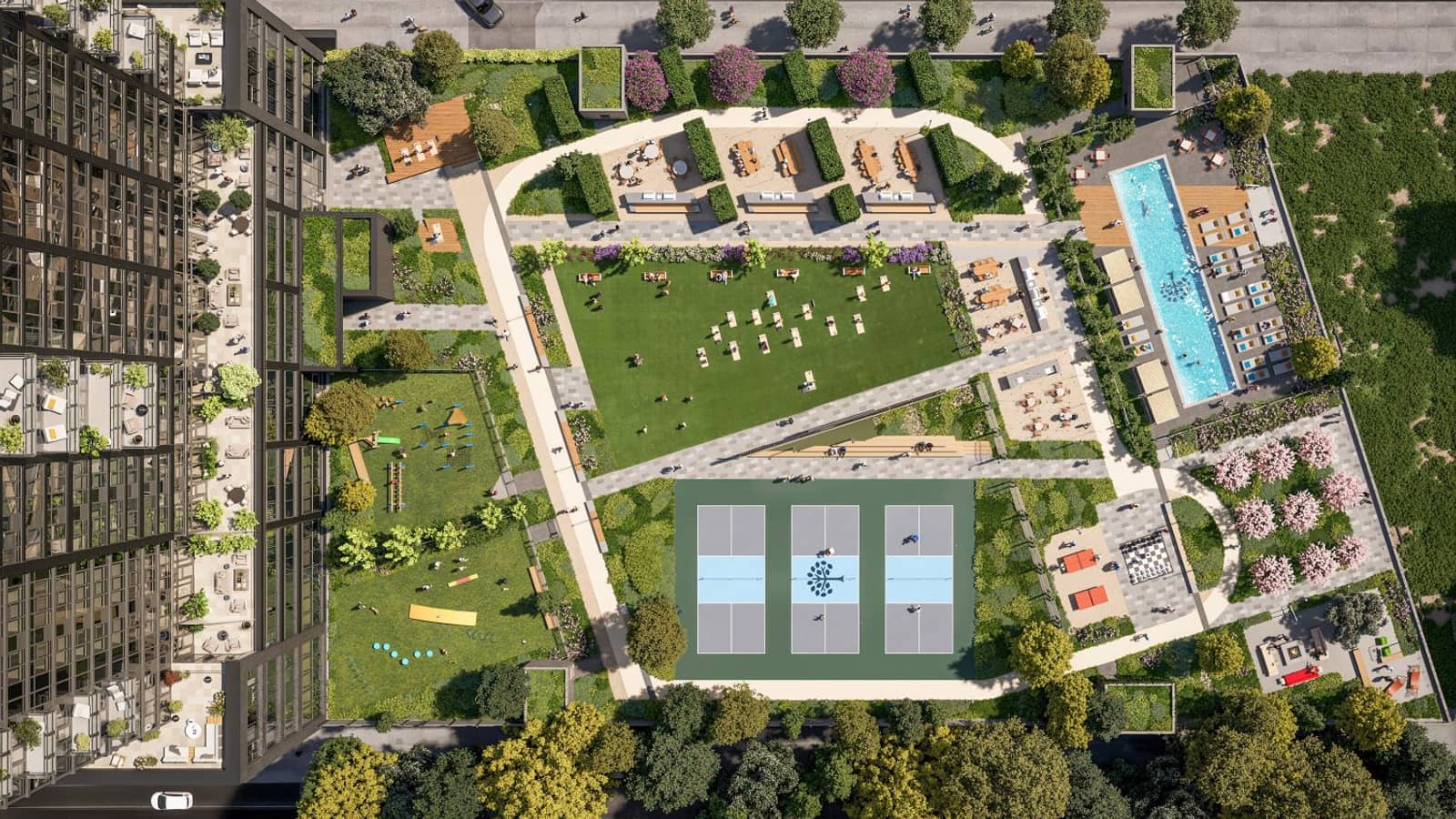 Top-down rendering of a roof deck beside a glass tower at the left edge: a central lawn dotted with people, a long swimming pool at the upper right, three blue courts below the lawn, a playground at the left, seating and dining areas, flowering trees and a border of trees along the bottom