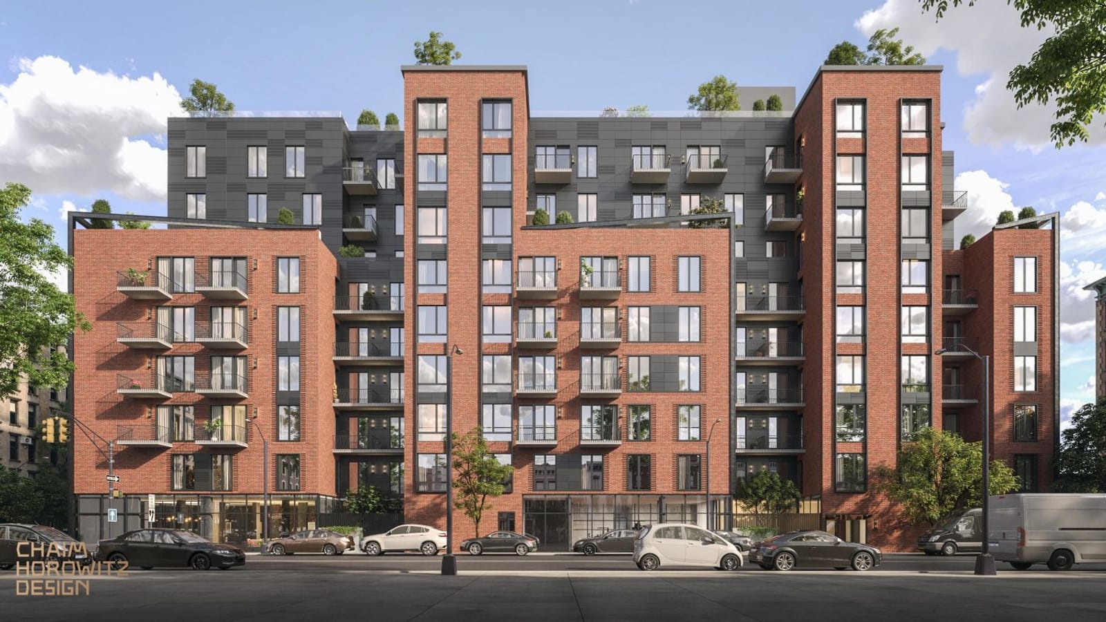 Rendering of a long red brick apartment building seen straight on, with two taller brick towers, dark gray panels on the top floors, many small balconies, a glass ground floor and cars parked along the street
