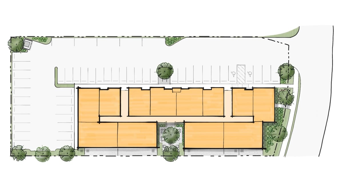 Hand-colored site plan sketch with an orange building footprint in two rows around a small courtyard, parking spaces on two sides and trees along the edges