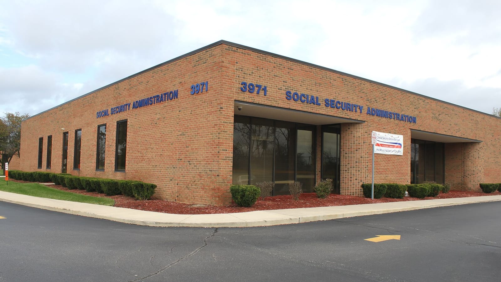 Brick Social Security office building at a street corner