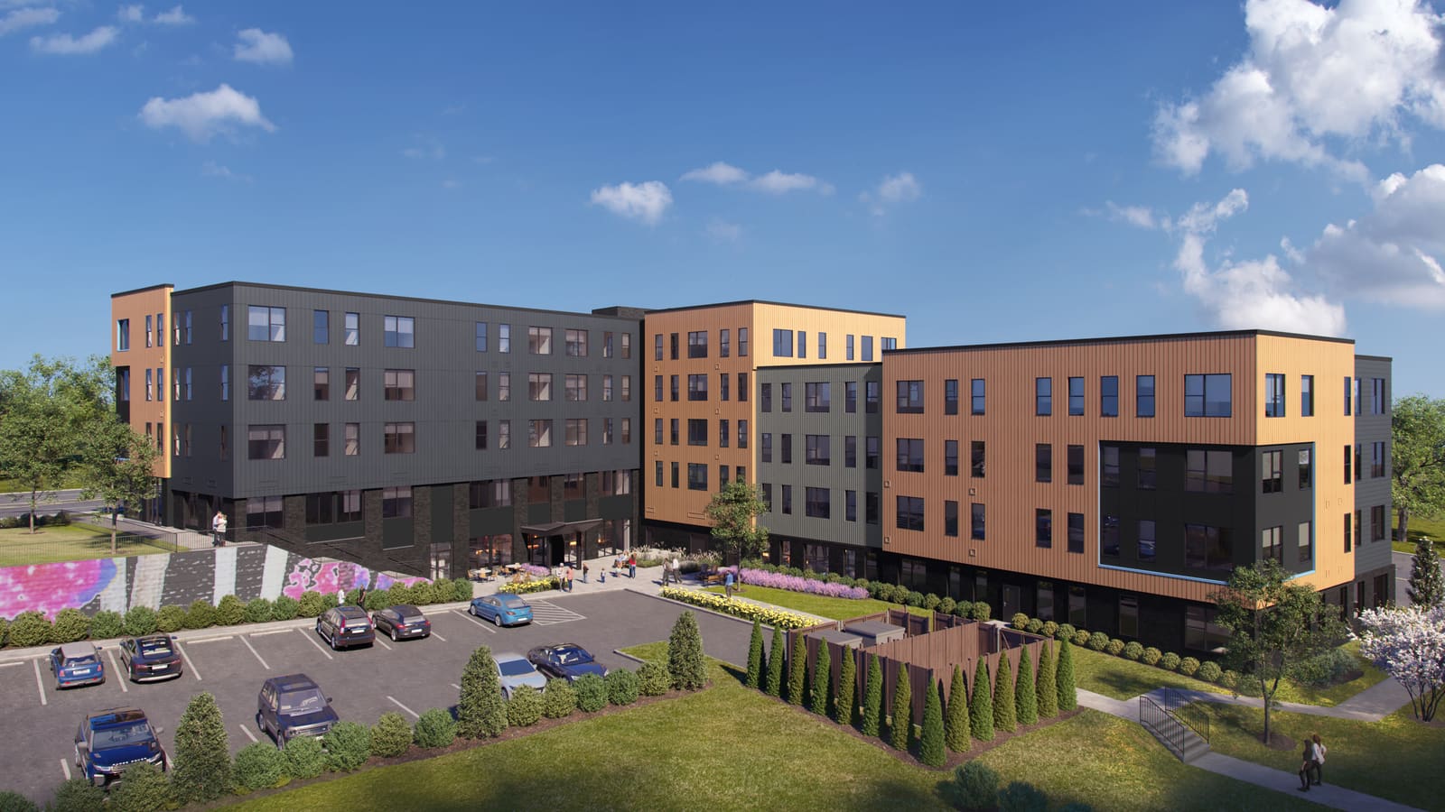 Rendering from above of the back of an apartment building, with tan and dark gray wings around a parking lot, a lawn and a planted patio