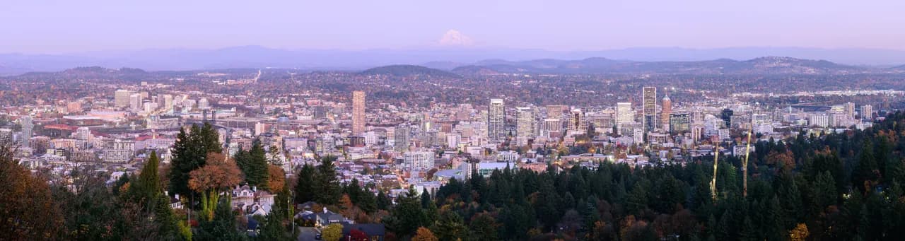 Portland skyline and Mount Hood viewed from Pittock Mansion at dusk