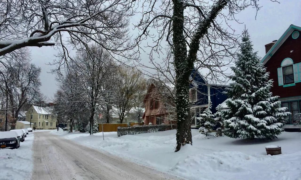 Snow along Maryland Street and wooden houses in Buffalo’s Allentown neighborhood