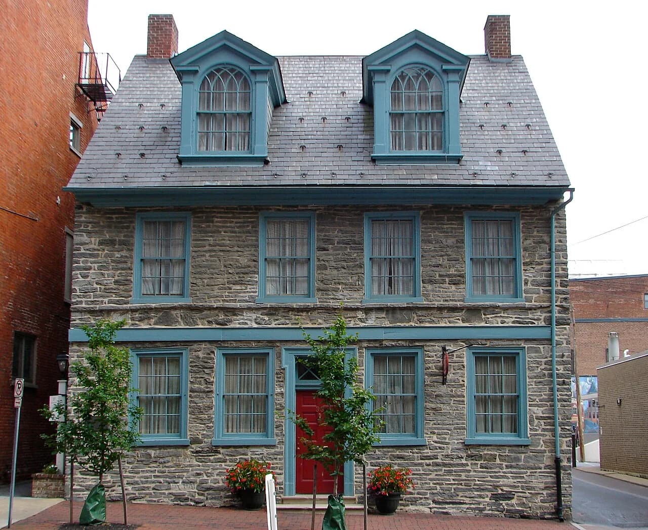 Historic house and neighboring brick buildings on Duke Street in Lancaster, Pennsylvania