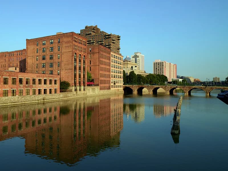 Downtown Rochester buildings reflected in the Genesee River